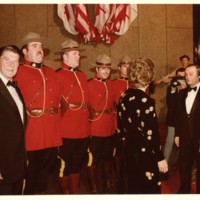 Photo of President of the United States Ronald Reagan and Mrs. Reagan with Royal Canadian Mounted Police